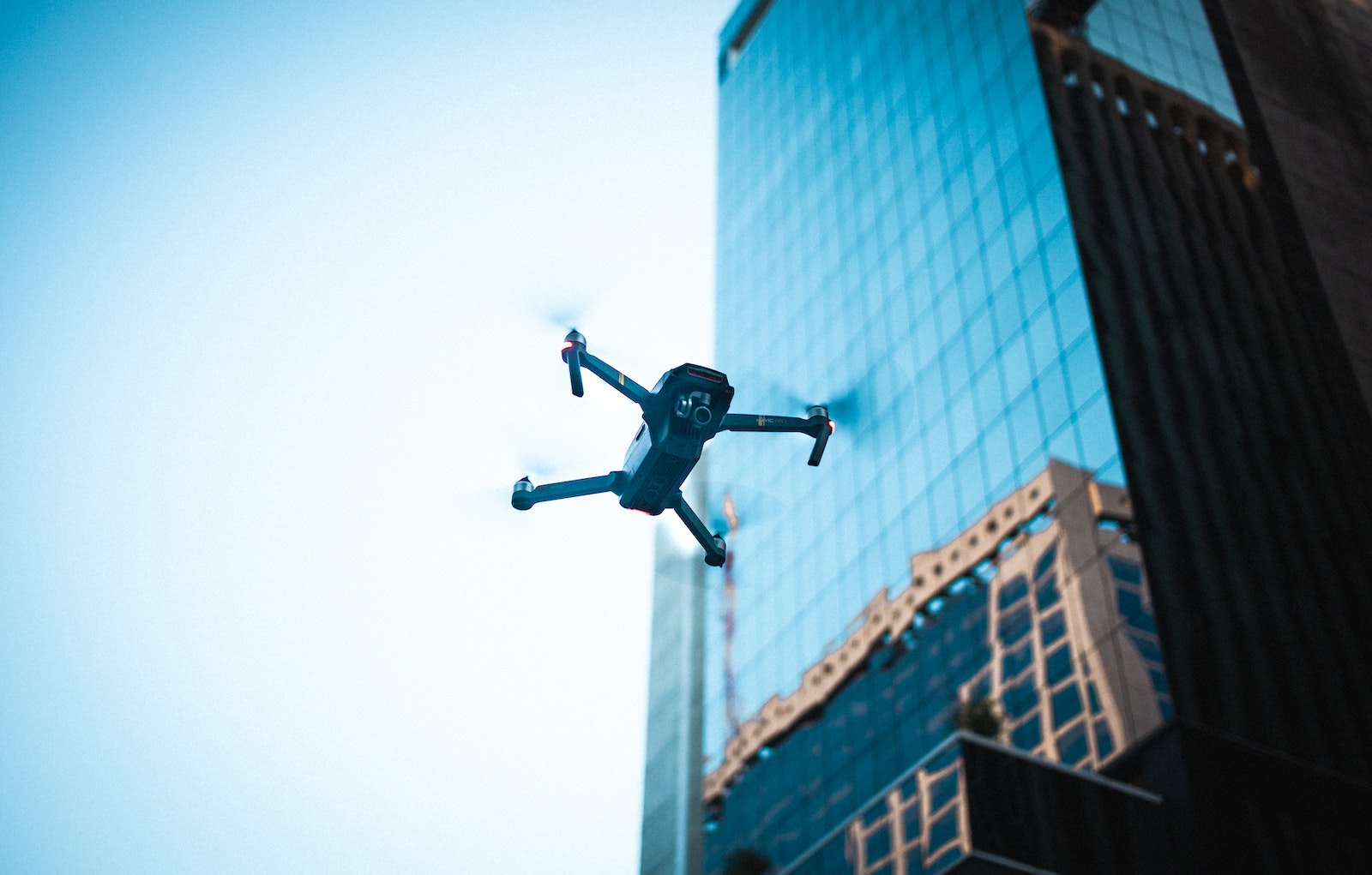 A drone on its mission, ensuring the efficient inspection of industrial flare stacks.
