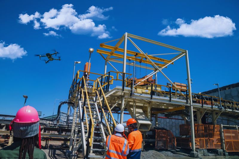 Drones, armed with advanced technology, map construction sites, providing critical data for the design phase.