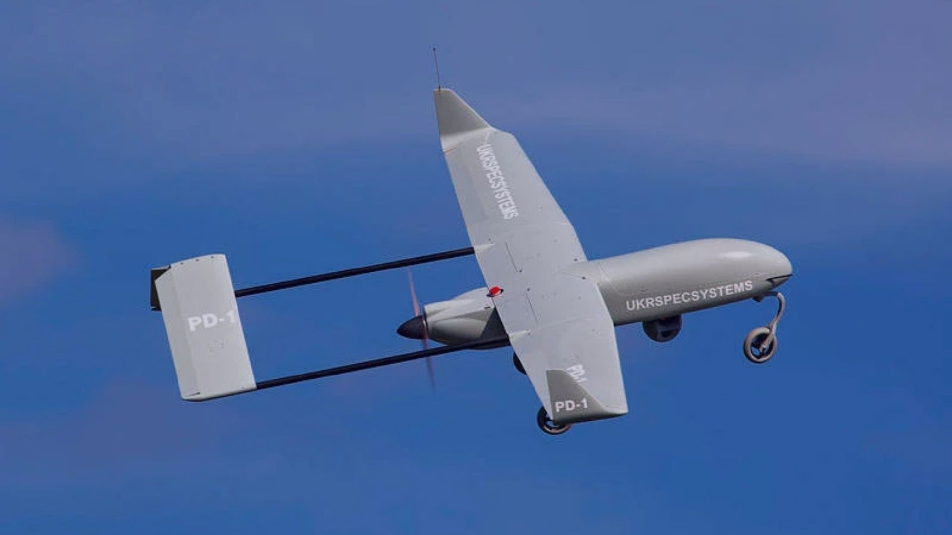 Fixed Wing Drones fly on blue sky
