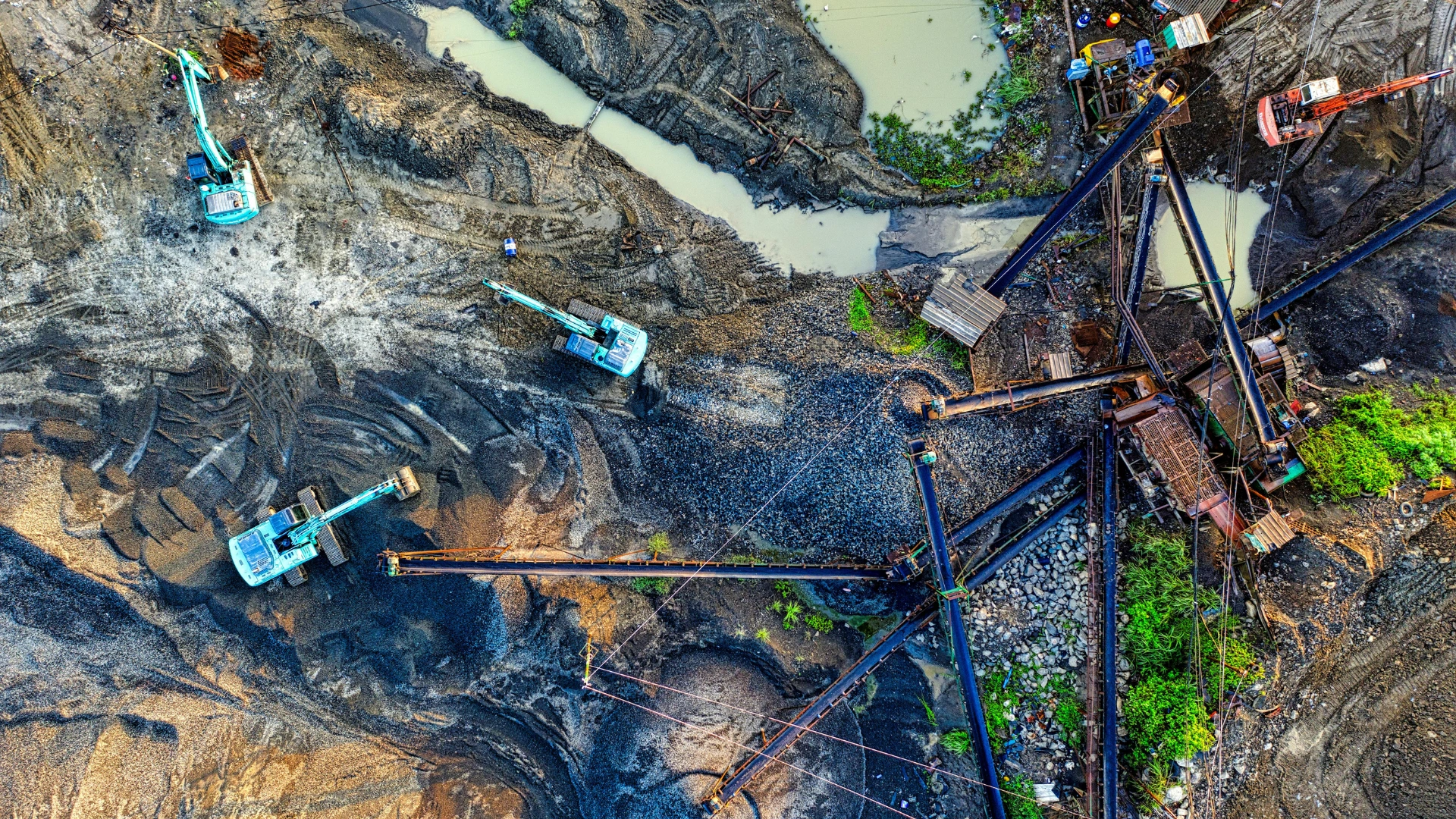 High-resolution satellite imagery of a construction site highlighting terrain and land-use patterns.