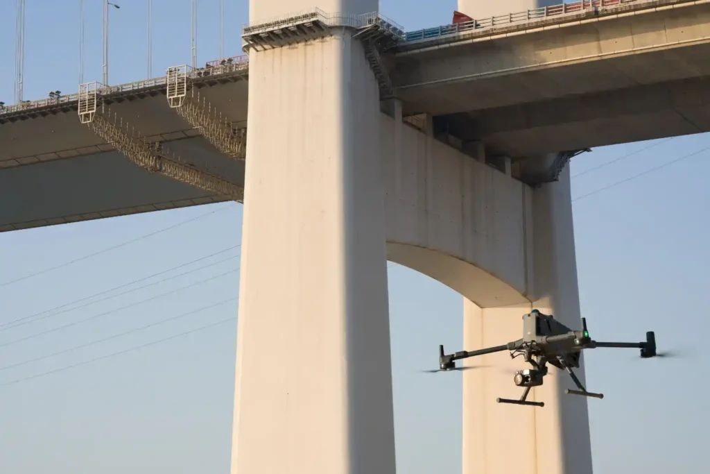 Drone inspection for bridge structural integrity.