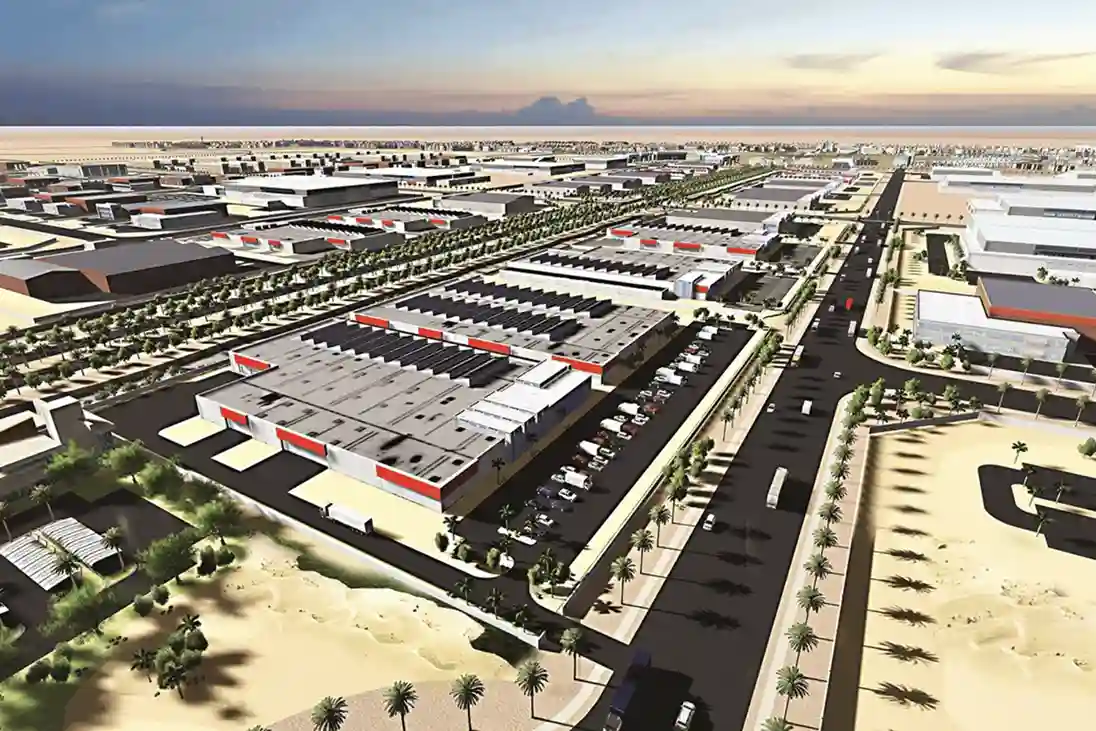A wide panoramic shot of an expansive industrial energy park featuring complex piping networks, refinery towers, and storage tanks under a clear sky.
