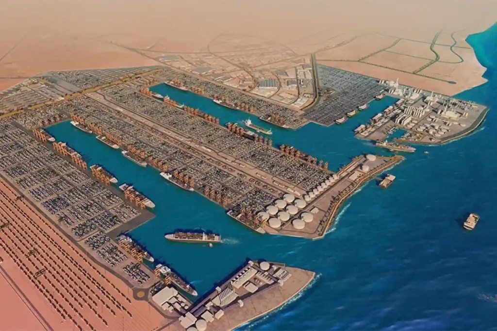 High-angle panoramic view of container terminals, quay walls, and gantry cranes at King Abdullah Port.